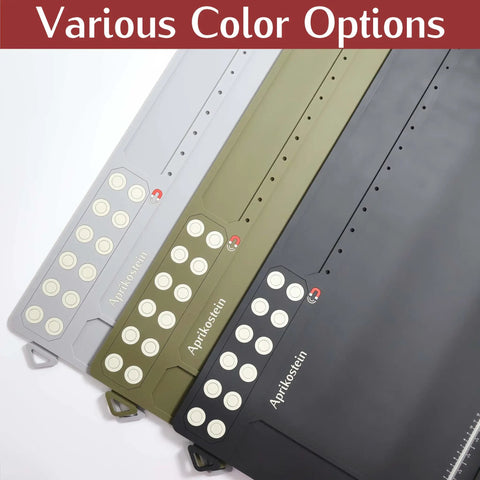 Hella Spacious Magnetic Gun Cleaning Mat Fifty Point Two Inches Long Built Tough Oil Resistant Floor Pad With Tool Slots For All Long Guns And Handguns in grey, green, and black colors.