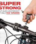 Using 13 In 1 Y Wrench Bicycle Multi Tool With Interchangeable Allen Hex Torx Flat Head And Phillips Bits on bike handlebar