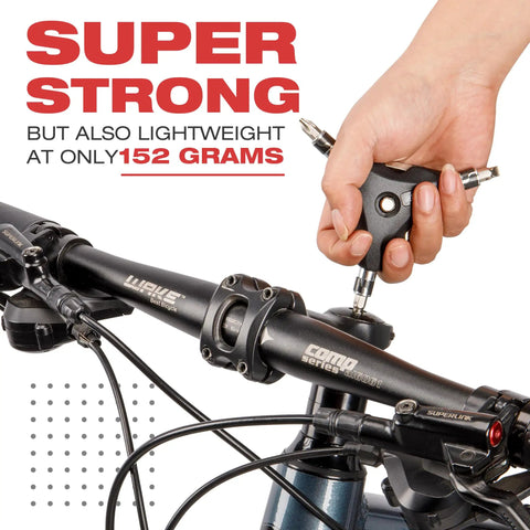Using 13 In 1 Y Wrench Bicycle Multi Tool With Interchangeable Allen Hex Torx Flat Head And Phillips Bits on bike handlebar