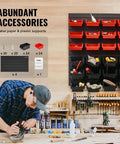 48 Bin Wall Mounted Storage Bins Rack Organizer with red and black bins, installed in workshop with person working