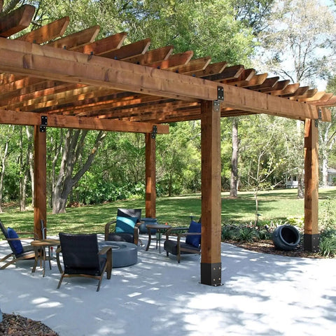 Hella Durable Heavy Duty Post Brackets 4 Pack Matte Black Wood Column Base Connectors for deck railing in a pergola.