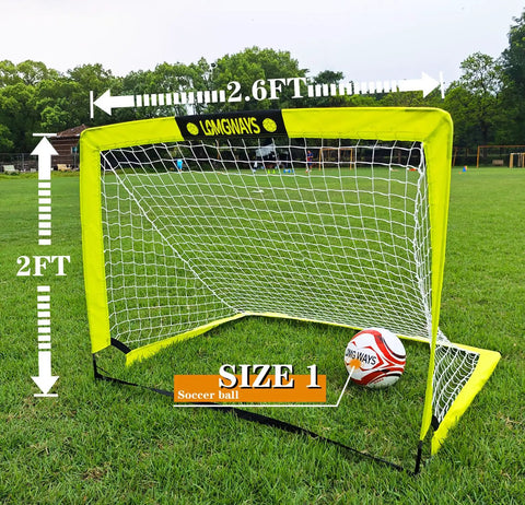 Go To Portable Backyard Soccer Goal Kit With 2 By 2.6 Ft Net, Ball, Pump, Ground Stakes And Carry Bag on grassy field