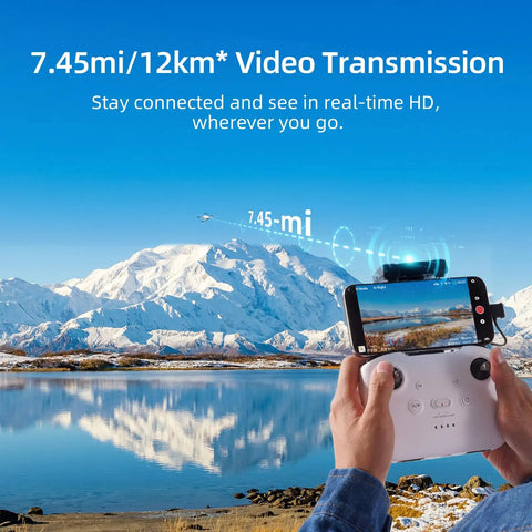 Person holding controller for Top Of The Line Mini Drone With Camera Cranking 4K 60fps Smooth Videos And 8K Ultra-Clear Photos Plus Includes 256GB Micro SD Card And Extra Batteries For Insane Flight Time On Your Next Epic Adventure against scenic mountain backdrop.