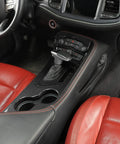 Slick ABS Carbon Fiber Gear Shift Lever Panel Trim Fits 2015-2025 Dodge Challenger Console Shifter Cover in red leather interior.