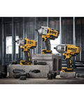 Three 20V Max Cordless 1/2 Inch Impact Wrenches With 4 Speed High Torque Beefy Brushless Motor displayed on cinder blocks