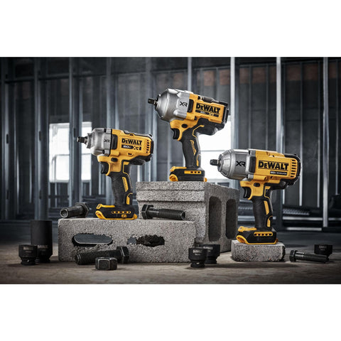 Three 20V Max Cordless 1/2 Inch Impact Wrenches With 4 Speed High Torque Beefy Brushless Motor displayed on cinder blocks