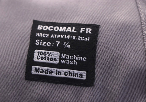 Label showing size 7 3/8 on Workhorse Flame Resistant Welding Cap 10 Oz Cotton Duck Exterior With Water Repellent Oil Resistant Finish.