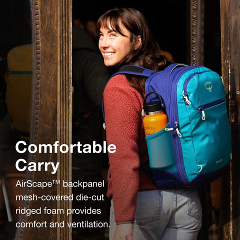 Woman carrying Daylite Expandable 26 Plus 6 Travel Pack Black Lightweight Durable Daypack With 6L Expansion For Flexible Capacity Ideal For Weekend Getaways And Extended Trips, blue color variant, outdoors.