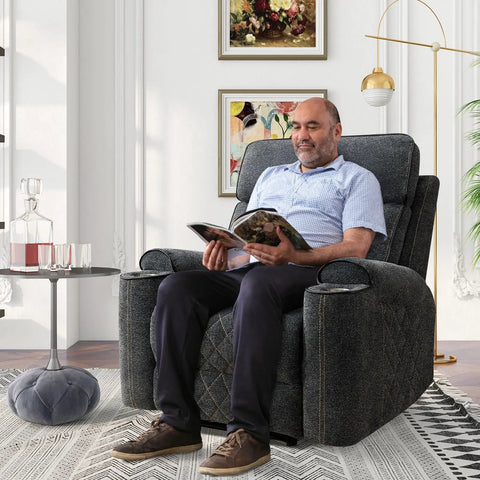 Man reading in dark gray Electric Power Recliner Chair With Soft Fabric Upholstery Overstuffed Heavy Duty Sofa Chair in living room.