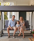 Family sitting on Modern Outdoor Patio Swing With Adjustable Canopy, 2 In 1 Porch Swing Bed With Removable Cushion, Gray