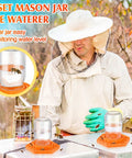 Beekeeper using 8 Pack Silicone Bee Feeder for Mason Jars Watering Station Beekeeping Drinking Equipment with Glass Jars