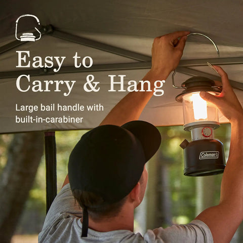 Person hanging Beast Bright 800 Lumen LED Lantern With USB Charging Ports using a carabiner under a canopy