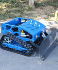 Remote Control Lawn Mower With RC Tracks For Slopes And Uneven Ground on asphalt surface, blue heavy-duty unit with tracks.