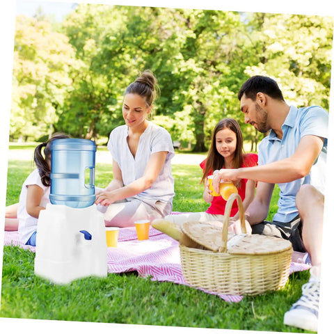 Family enjoying picnic with Portable Mini Cold Water Dispenser For Countertop Bottled Water Holder With Slip Design Easy To Clean Space Saving