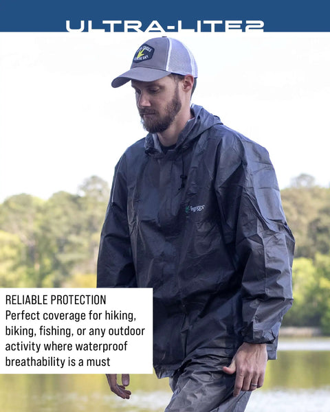 Man wearing Ultra Lite2 Waterproof Breathable Rain Suit With Jacket And Pants in outdoor setting