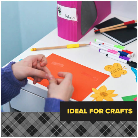 Person using Double Sided Craft Tape 1/2 Inch Wide By 300 Inch Long Permanent Adhesive For Scrapbooks, Cards, School Projects, And Paper Crafts