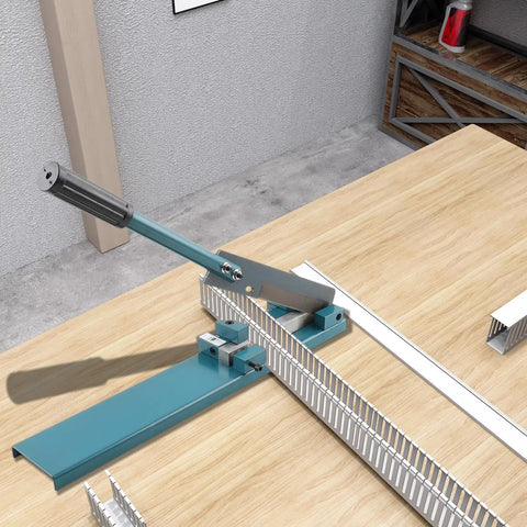 Manual Wire Duct Cutter For PVC Trunking And Open Slot Ducts in use, showing adjustable blade and blue handle on wooden table.