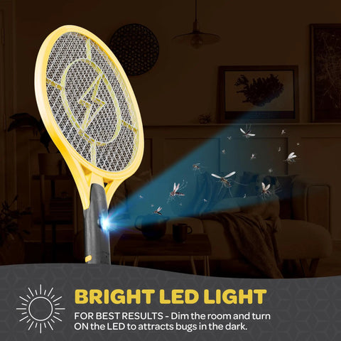 Portable 4000 Volt Electric Bug Zapper Racket Set Of 2 With USB Rechargeable Battery Indoor Outdoor Mosquito Killer LED Light Attractant showing bright LED light attracting bugs indoors
