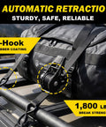 10 Foot Heavy Duty Retractable Ratchet Straps With Slick Auto Rewind System And Quick Release Clasp For Zero Drama Load Hauling 1800 Lb Grip Black Two Pack securing a black duffel bag.