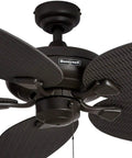 Close-up of Duval 52 Inch Indoor Outdoor Ceiling Fan with Hand Carved Basswood Blades, Bronze Finish, showing pull chain