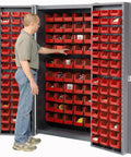 Top Tier Deep Door Bin Cabinet Loaded With 156 Red Plastic Storage Totes For Shop Organization Heavy Duty Polypropylene Containers Secure Lock Hasp Built Different, man accessing organized totes.