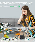 VIVOSUN black submersible water pump inside a fish tank with goldfish