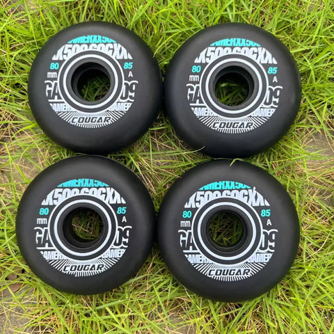 Inline Skate Wheels 4 Pack For Outdoor Indoor Use 78mm 80mm 85A With Bearings Roller Hockey Replacement Wheels displayed on grass