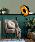 Vintage Industrial Tripod Floor Lamp With LED Light, Large Shade, Nautical Matte Black And Gold Finish in living room