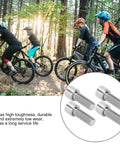 Image of 4 Pack M7x20mm Stem Bolts For Bike Handlebar, Alloy Stem Screws, Lightweight Yet Strong next to cyclists in a forest.
