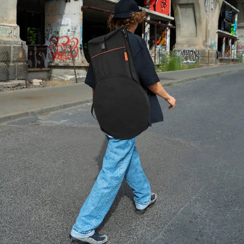Person walking with the Road Ready Oxford Fabric Drum Storage Bag With Hella Tough Waterproof Seams on their back.
