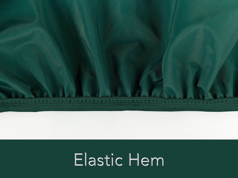 Close-up of green elastic hem on Classic Outdoor Glider Cover For Patio Furniture Weatherproof Shield With Thick 12 Gauge Vinyl