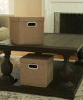 Heavy Duty Foldable Cube Storage Bins With Secure Snap Lids And Polished Chrome Handles In Warm Brown Linen Fabric For Closets Shelves And Bedroom Organization No Hassle Top Shelf American Craft on a coffee table.