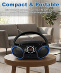 Portable CD Player Boombox With Top-Loading Disc, 20-Track Programmable Memory, Repeat One And All, AM/FM Stereo, on a table