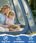 Mother and child reading inside 10x10 Pop Up Screen House Tent With Mesh Walls, Waterproof Instant Gazebo visible with butterflies.