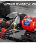 Workhorse 150Mm Bench Grinder Equipped With A Beefy 450W Induction Motor grinding metal with sparks flying in workshop.