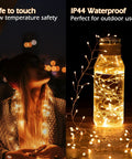 Person with Plug In Fairy Lights 10 Feet 200 LED Copper Wire Cluster Lights Waterproof Warm White wrapped around and in jar