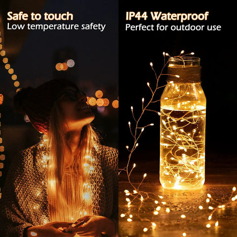 Person with Plug In Fairy Lights 10 Feet 200 LED Copper Wire Cluster Lights Waterproof Warm White wrapped around and in jar