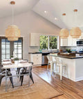 Hand Woven Bamboo Pendant Light With Natural Rattan Basket Shade Dope Beige Bamboo Chandelier in modern kitchen setting