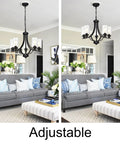 Farmhouse 5-Light Chandelier Pendant Light In Black Finish With Clear Glass Shades over a living room with sofa and decor