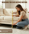 Adjustable 3 By 132 Inch Under Couch Blocker And Bed Gap Stopper Made With Durable Stretch Foam, measuring the gap under a sofa.