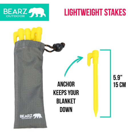 Lightweight Beach Tent Stakes Pack Of Four 5.9 Inch Sand Tarp Pegs with Anchor in safety yellow next to a storage bag