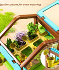 Top view of Kids Plant Growing Kit with Greenhouse and Grow Light Drip Irrigation System showcasing plant setup inside the greenhouse.