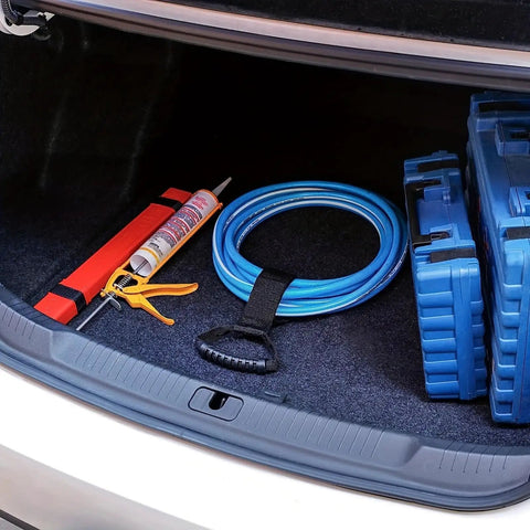 Versatile 17 Inch Adjustable Black Nylon Storage Strap With Ergonomic Handle For Cords Garden Hoses Swimming Gear And Garage Tools Heavy Duty Organizer With Strong Velcro For Reusable Easy Grab And Go Neat Storage securing blue hose in car trunk