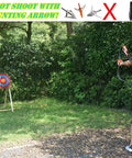 Archer aiming at traditional hand made straw archery target with text warning against using bladed hunting arrows for practice.