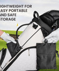 Golf Bag Organizer Pouch With 3 Zip Pockets And Sturdy Hook Multi Pocket Design attached to white golf bag on grass.
