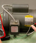 Analog Insulation Resistance Tester Megohmmeter With 400MOhm Range And 250V 500V 1000V Test Voltages in use on motor