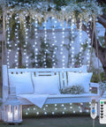 200 LED White Curtain Lights With Remote For 6.5 Ft By 6.5 Ft Window Backdrop USB Powered 8 Modes installed on outdoor swing