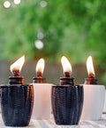 Glass Table Torch Set For Outdoor Patio Vibe, Herringbone Blue 3-Pack, decorative torches lit on a patio table, weather resistant