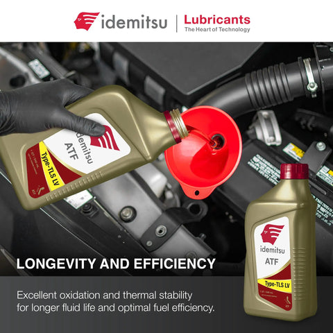 Pouring ATF Type TLS LV WS Automatic Transmission Fluid for Toyota Lexus Scion, red funnel, one quart bottle.