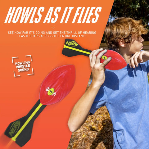Child throwing Vortex Aero Howler Foam Football With Mega Distance Passes Flight Tail For Long Throws Whistling Roar In Flight